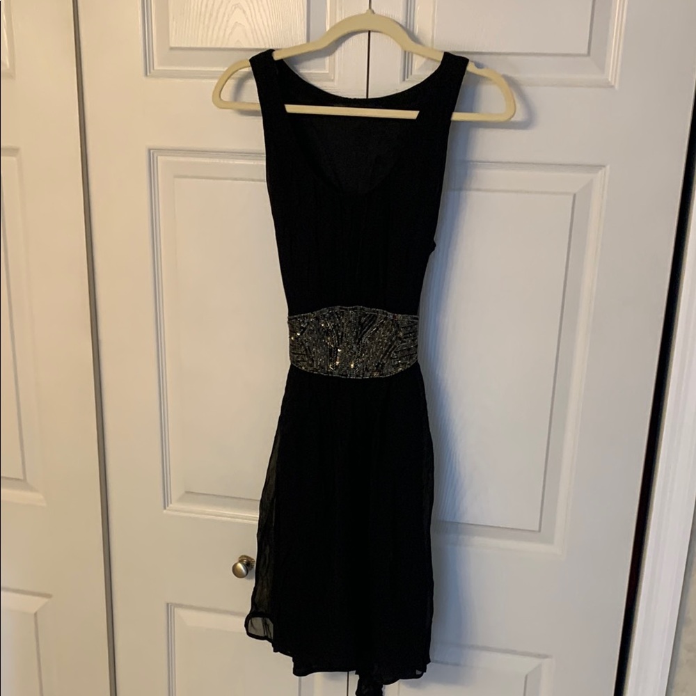Elegant Black Zara Sleeveless Dress with Embellished Waist